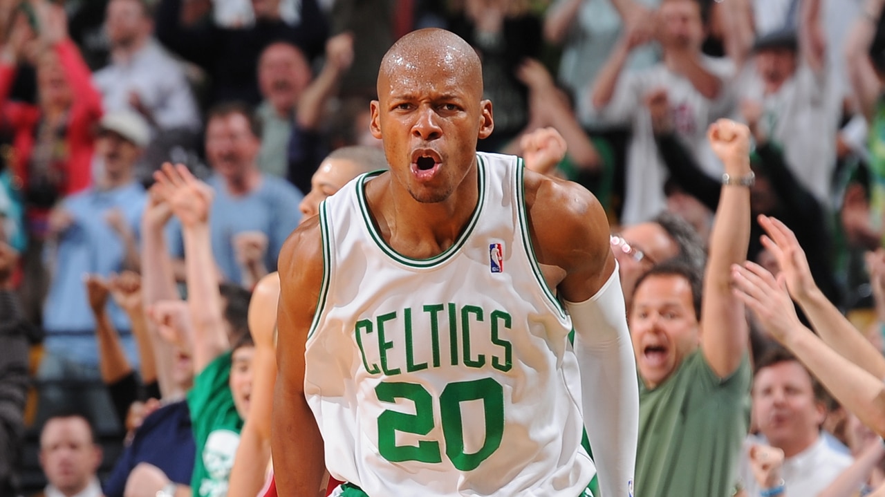 Ray Allen wearing Celtics jersey screaming with crowd in background